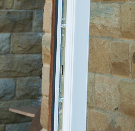 Close-up of the secure multi-point locking mechanism on uPVC French doors, ensuring enhanced security