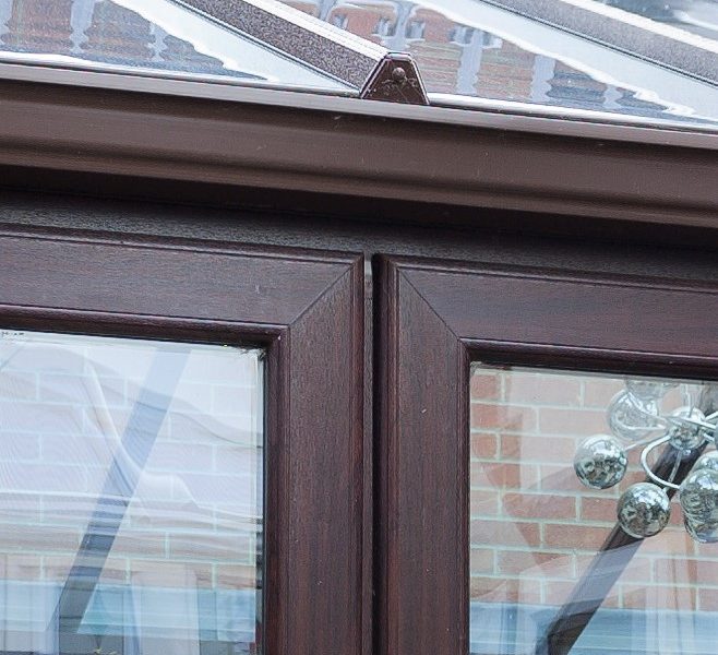 Close-up of the sculptured profile of uPVC French doors, showcasing its elegant design and clean lines