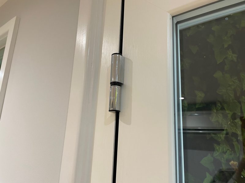 Four external hinges providing strength and smooth operation on uPVC flush French doors