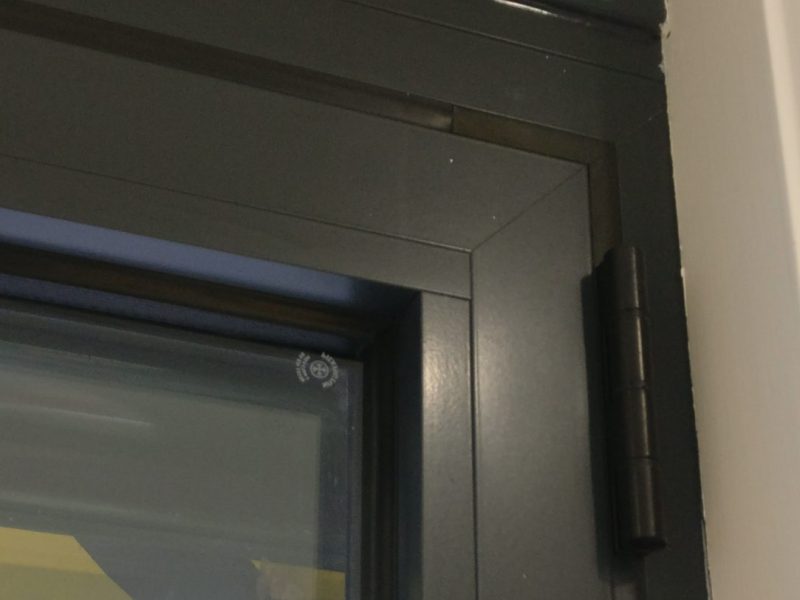 Close-up of durable corner bonds in aluminium residential doors, ensuring structural strength