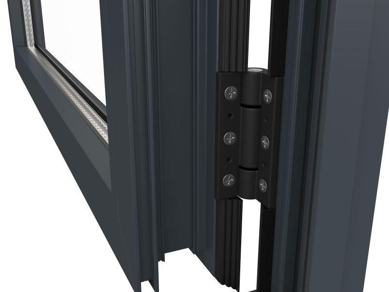 Close-up of sleek black hinges on an aluminium door, adding a modern touch and durable functionality