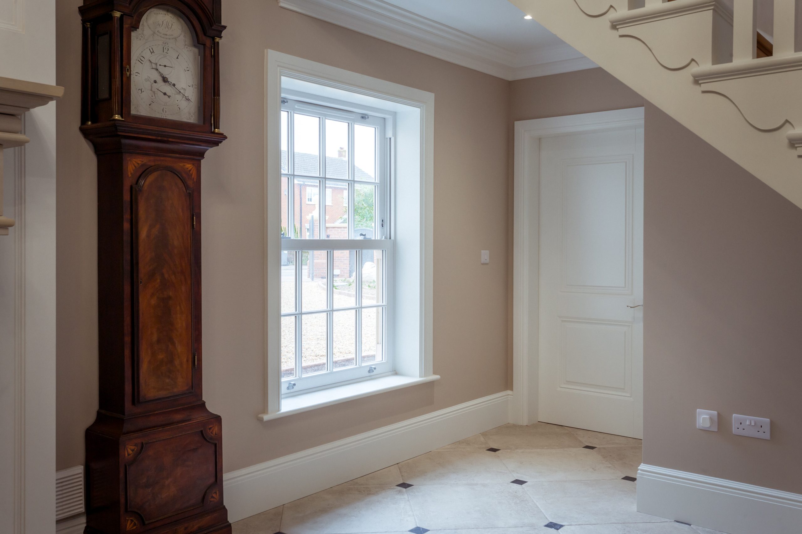 Close-up of Quickslide's fully mechanical uPVC sliding sash windows.