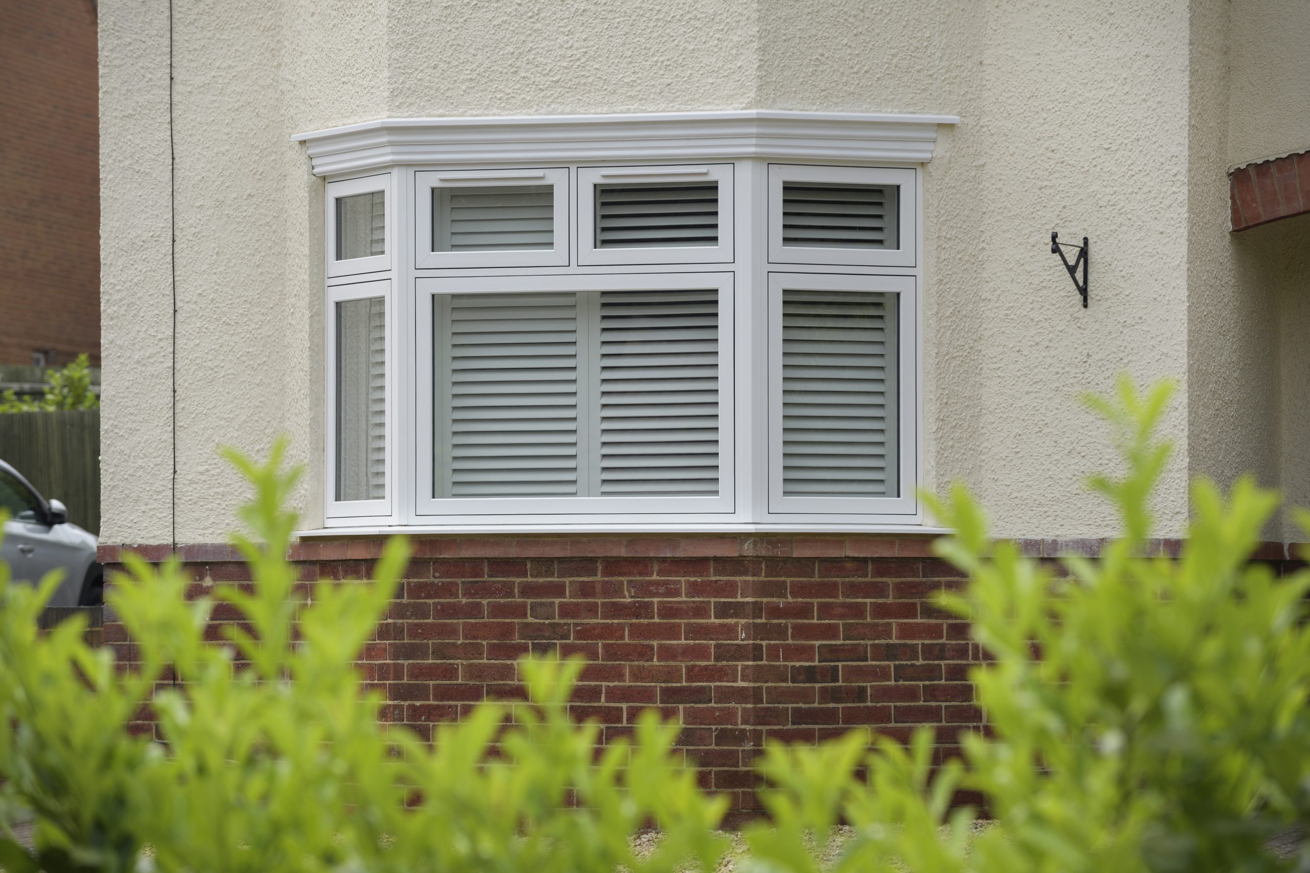 Close-up of a white uPVC flush casement window showing clean lines and smooth finish