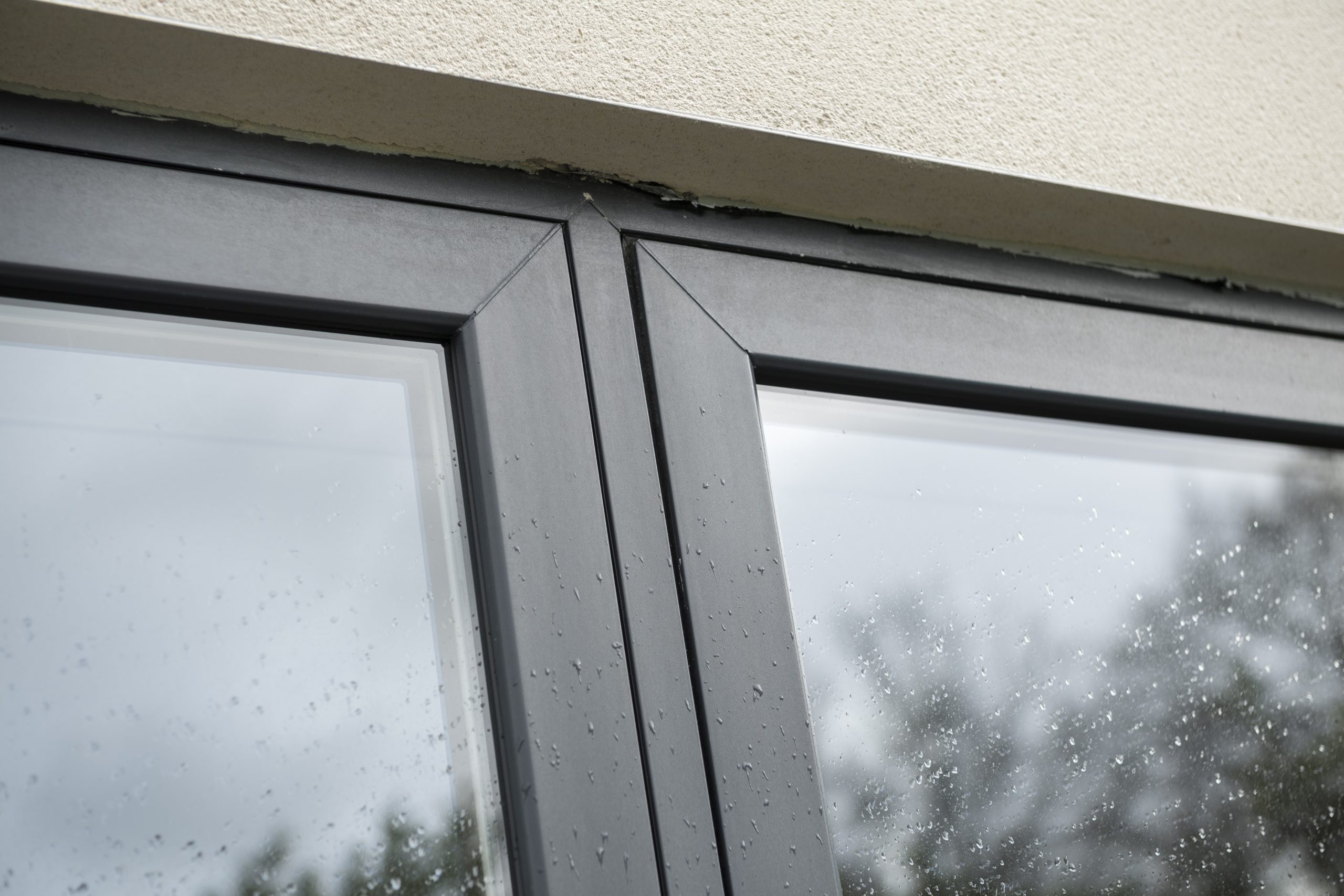 Skilled team manufacturing made-to-order uPVC flush casement windows at Quickslide’s in-house facility