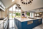 Slim aluminium bifold doors offering a cost-effective way to open up living spaces