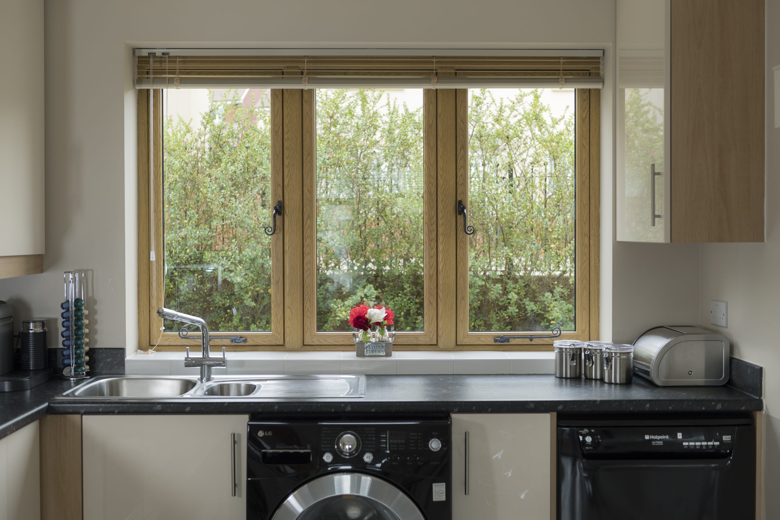Timber-look uPVC flush window with oak woodgrain finish