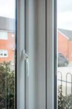 Detailed view of a side-hung uPVC casement window