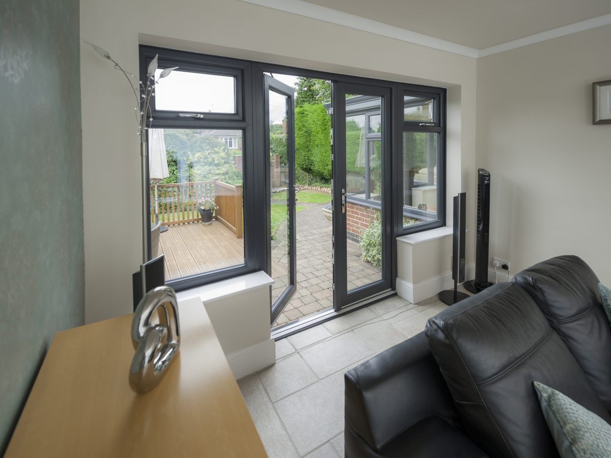 Elegant uPVC French Doors Opening to a Garden - Quickslide doors