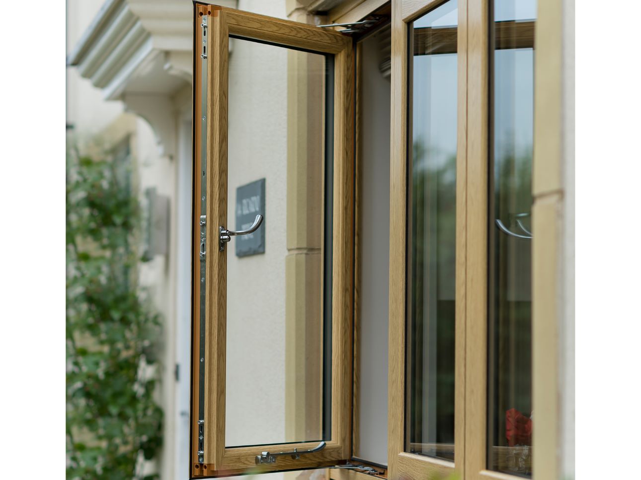 Oak wood effect finish for uPVC flush casement windows, combining a traditional look with modern performance
