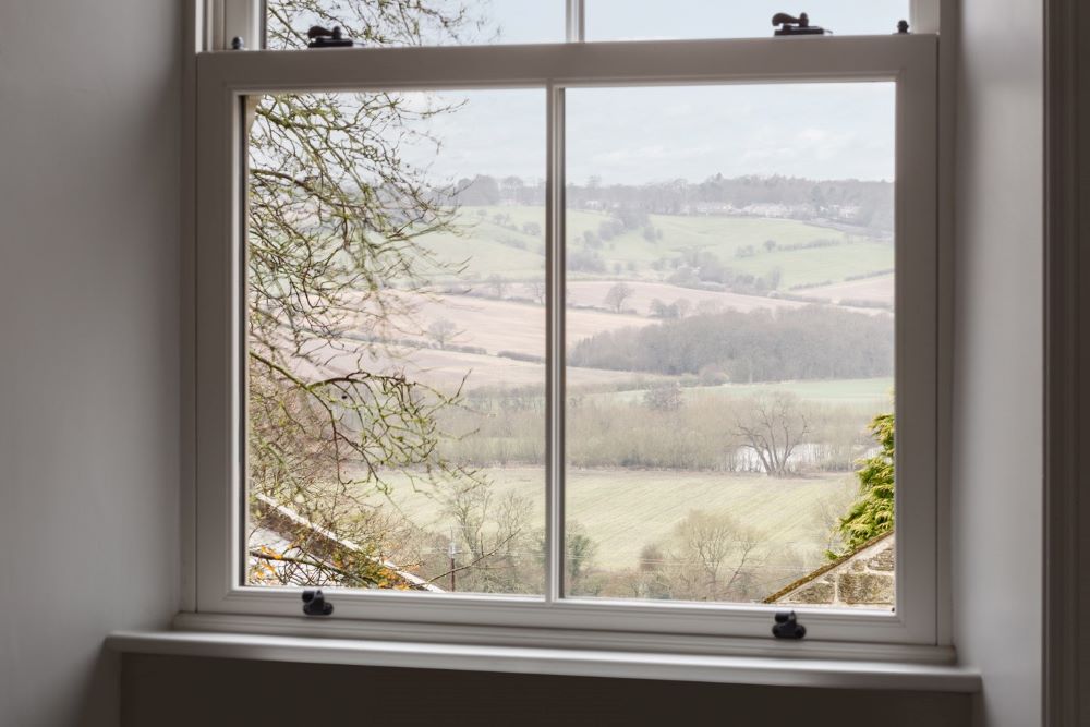 Durable uPVC sash window material with realistic timber alternative finish