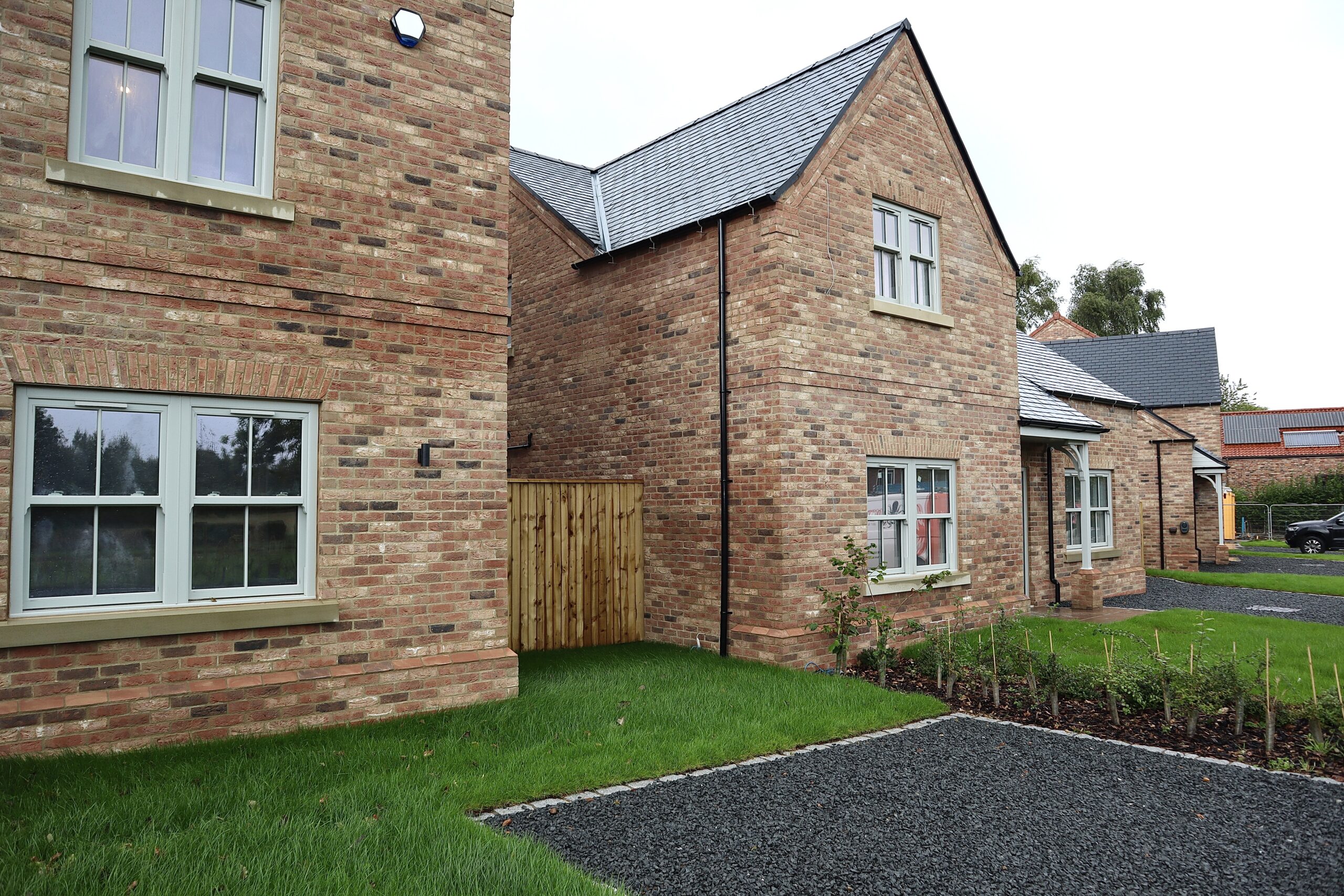 Heritage-style sash window design complementing modern construction and exterior finishes