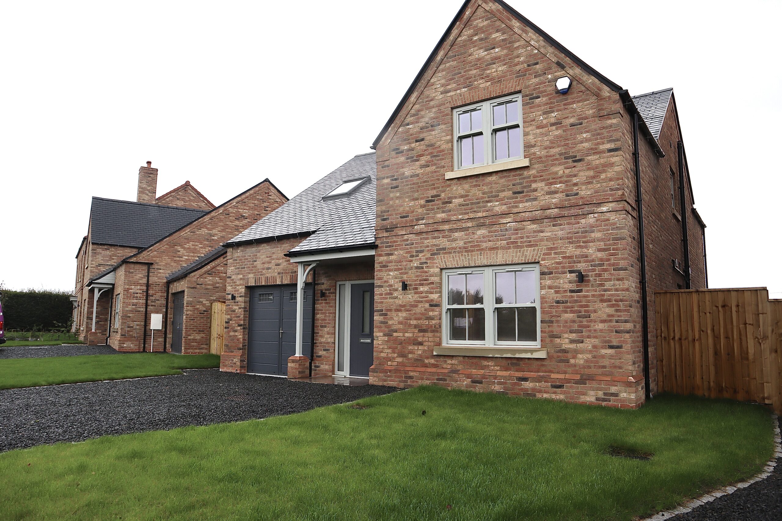 Agate grey uPVC sliding sash windows installed on a luxury Yorkshire Homes property