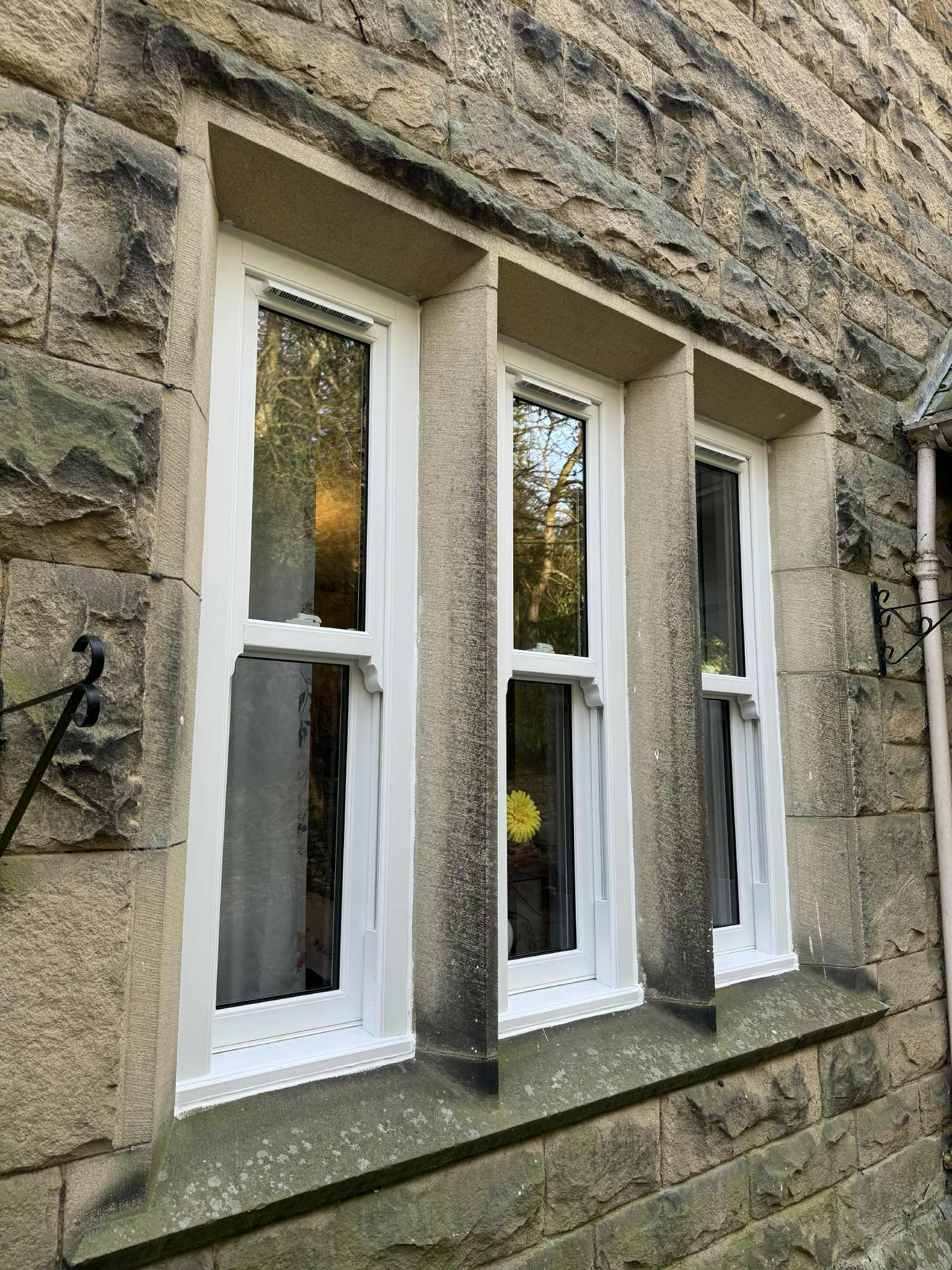 Slimline uPVC sash windows designed to preserve the look of historic buildings