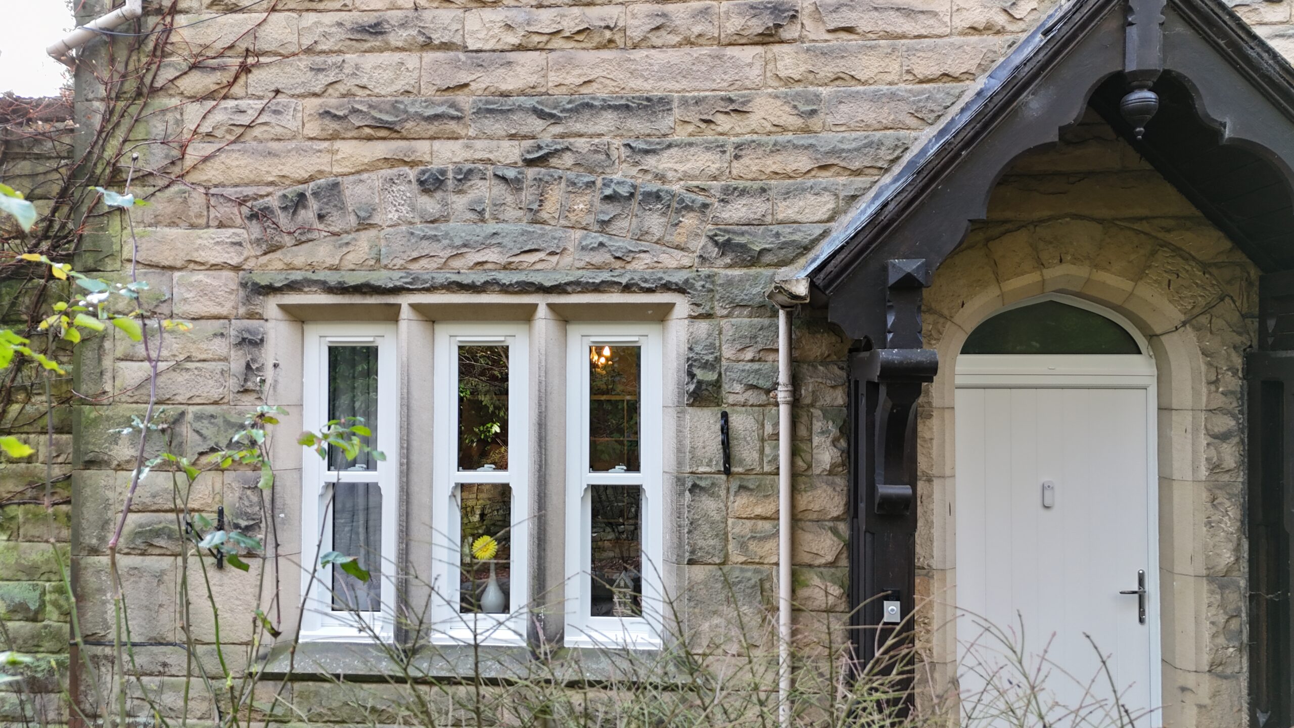 Composite and uPVC doors installed alongside sliding sash windows at Stancliffe Hall