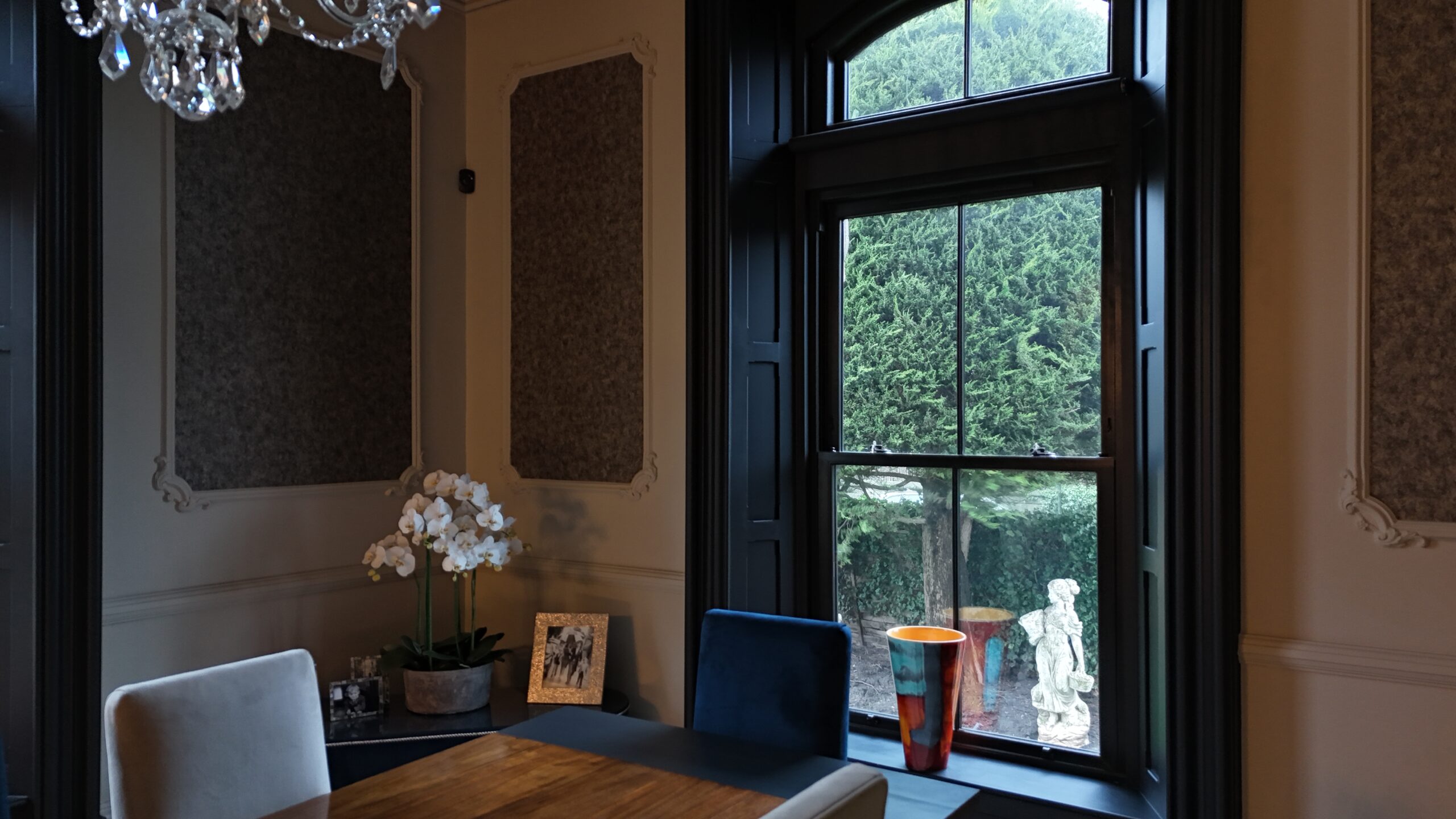 Black woodgrain sliding sash windows installed on a traditional Yorkshire property