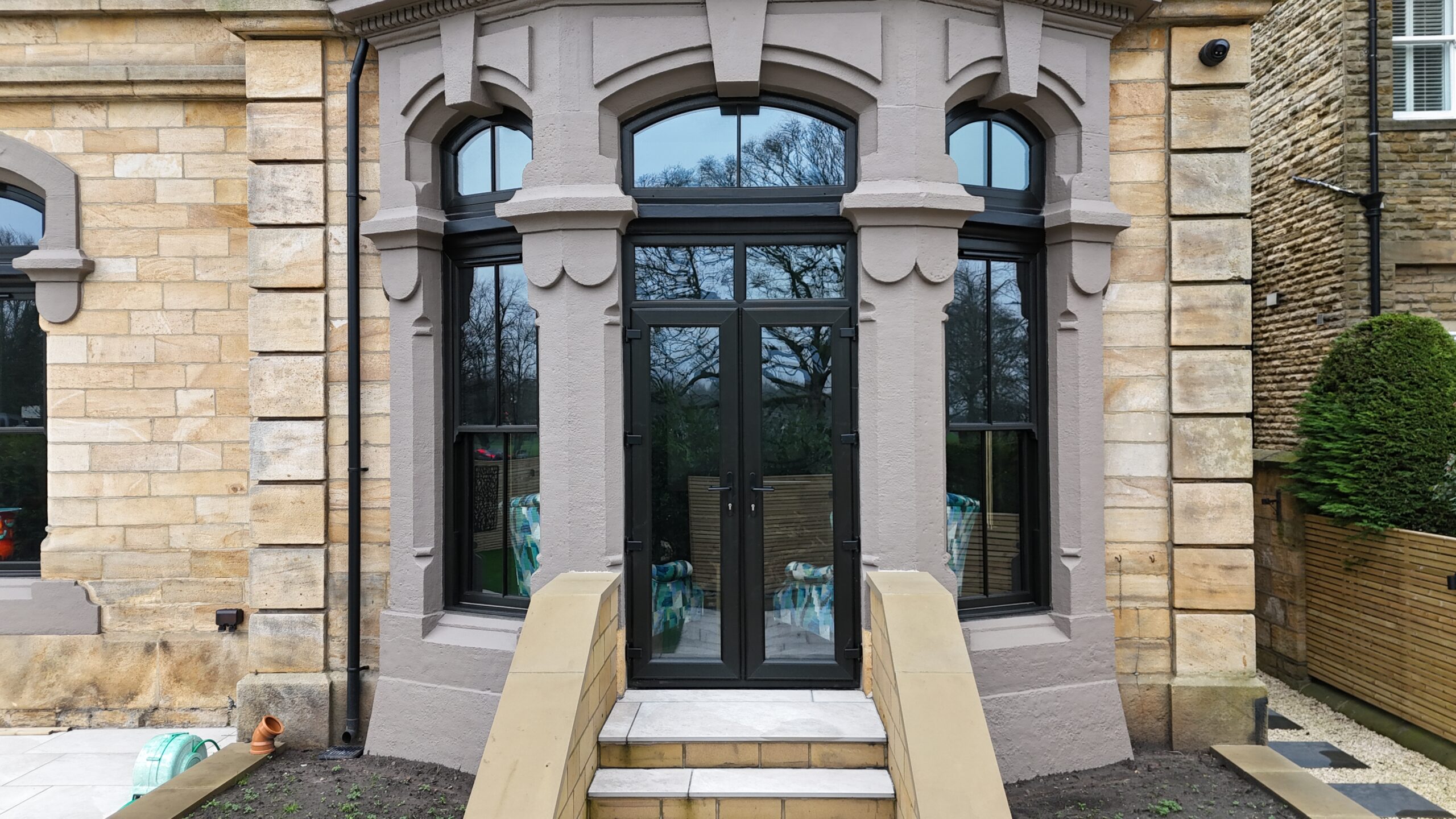 Black sliding sash windows and French doors installed on Yorkshire home