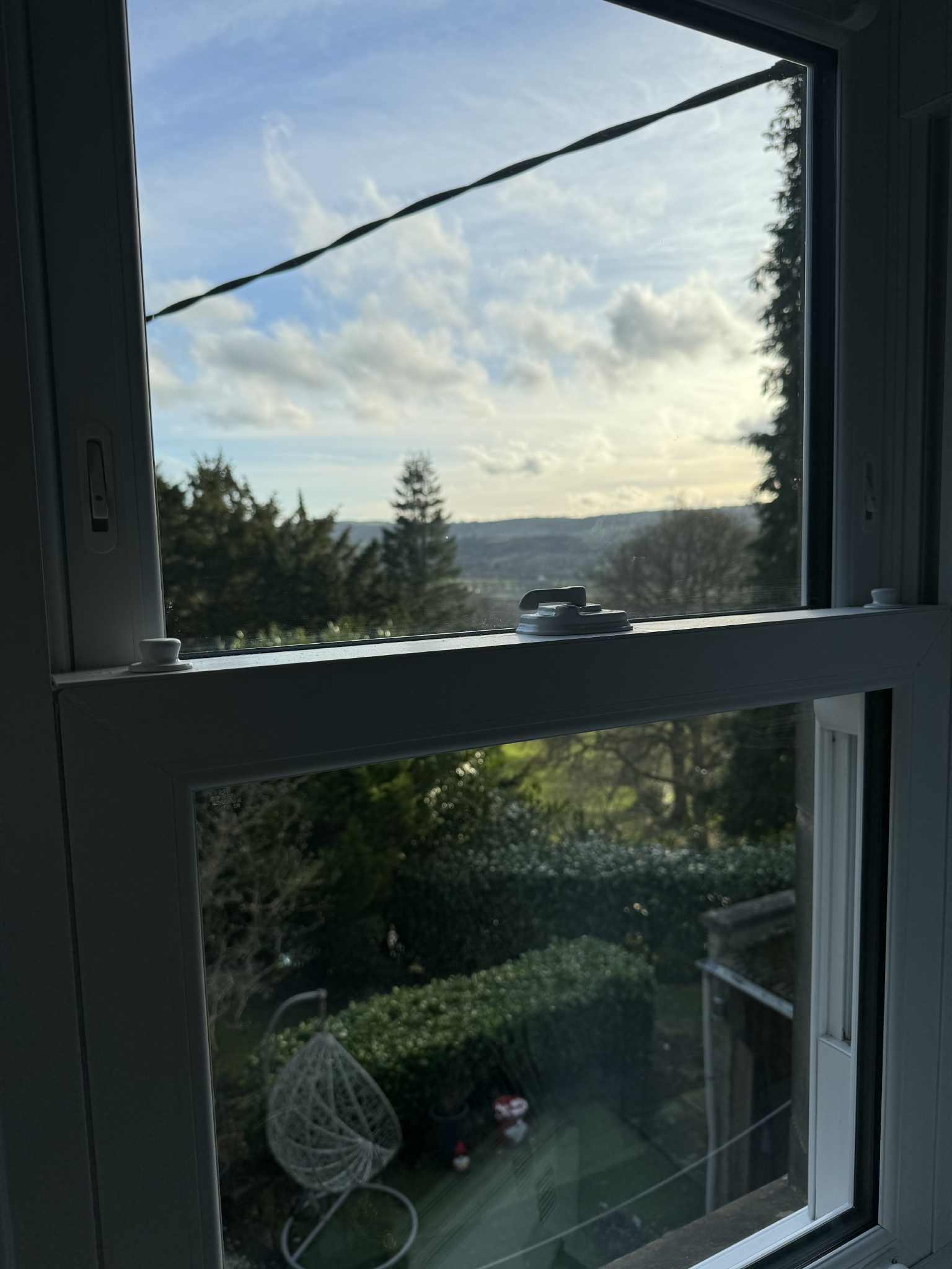 Traditional-style uPVC sliding sash windows fitted with heritage detailing