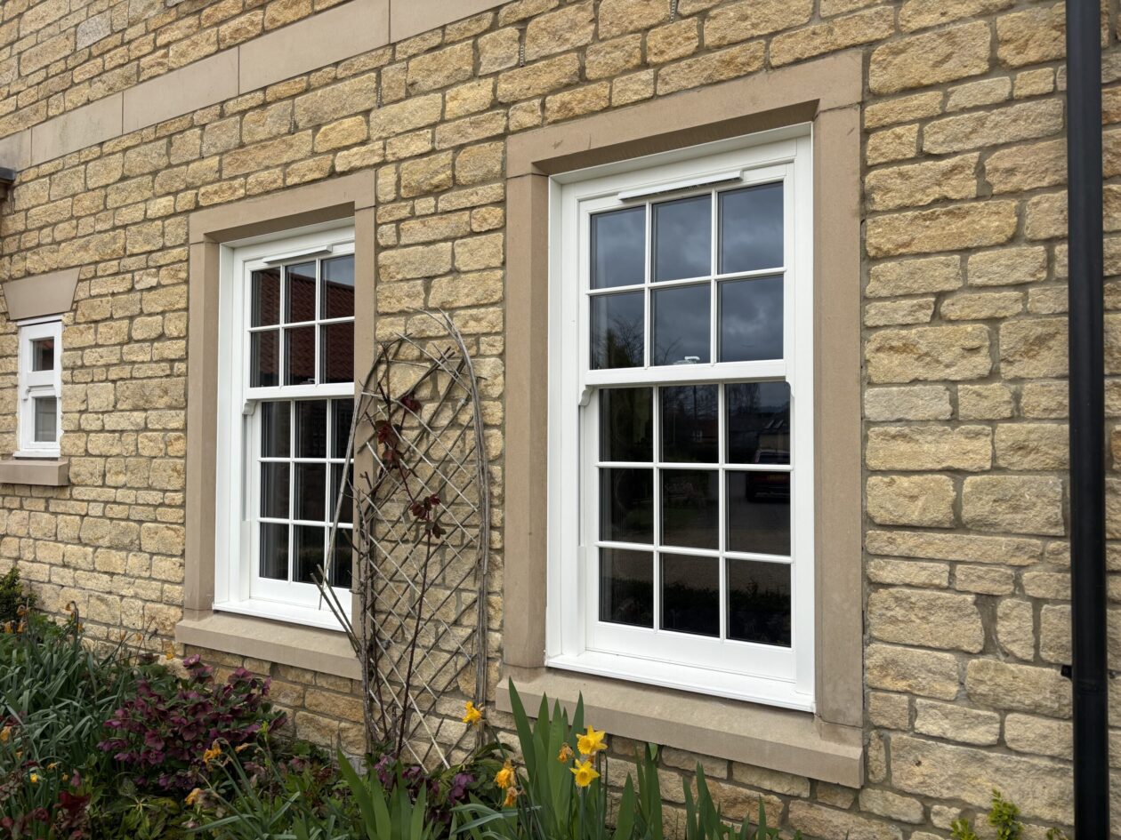 Run-through sash horns and mechanical joints on heritage-style uPVC sash window