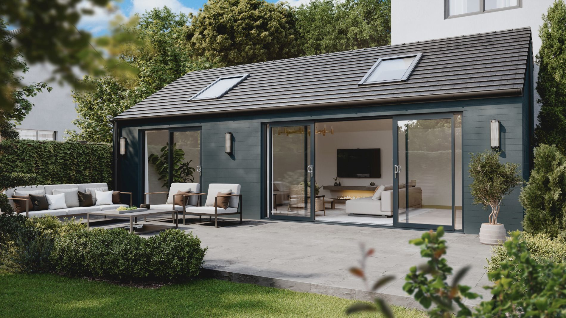 Aluminium sliding patio doors with slim frames opening onto a garden