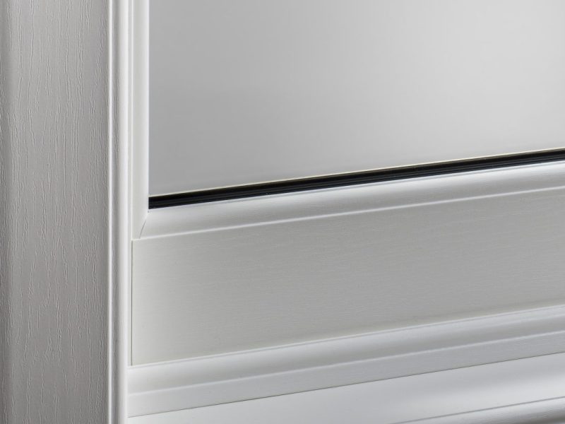 Close-up of a sash window with an ovolo weather bar for authentic heritage style