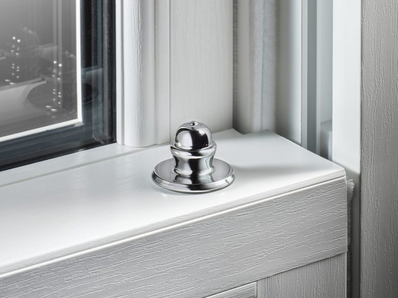 Tilt knobs used to open and tilt window sashes for cleaning, available in two styles.